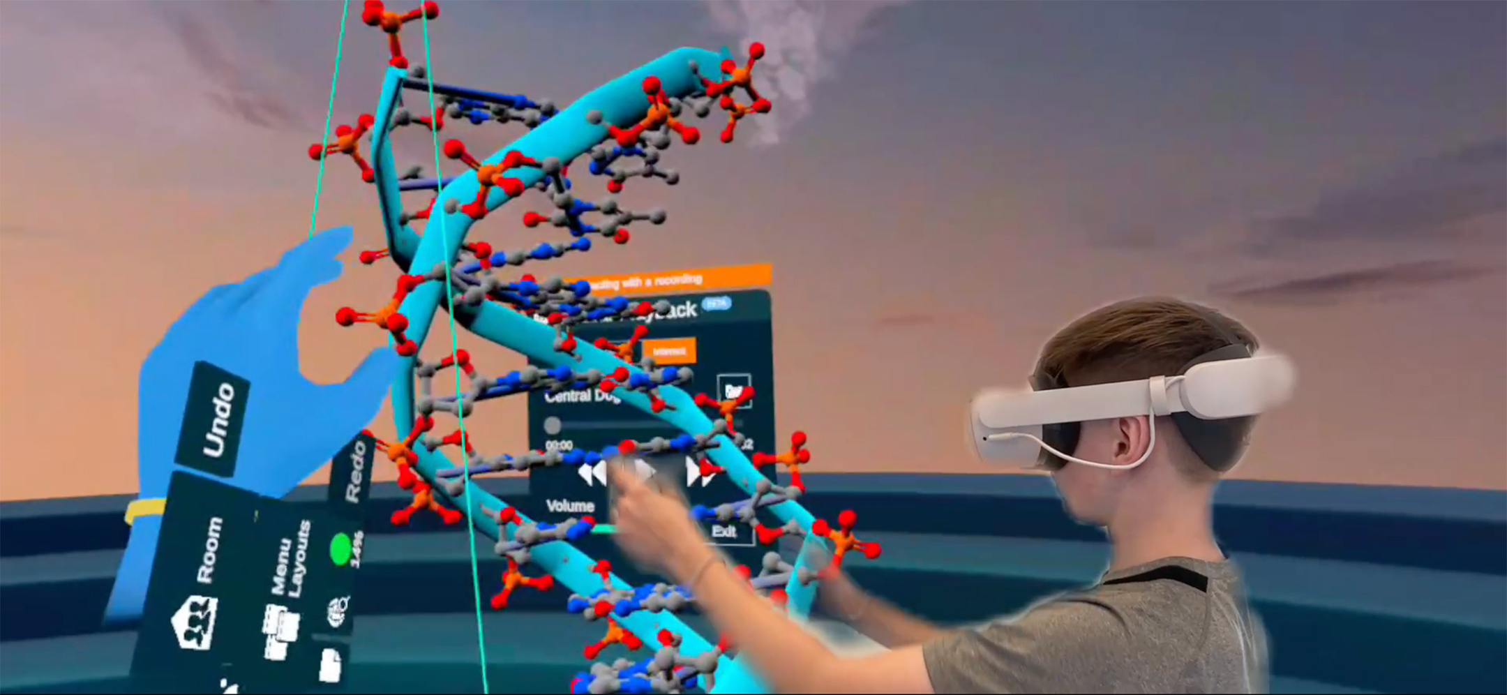 Screenshot from a video showing an elementary school student wearing a VR headset manipulating a DNA double helix in a virtual environment