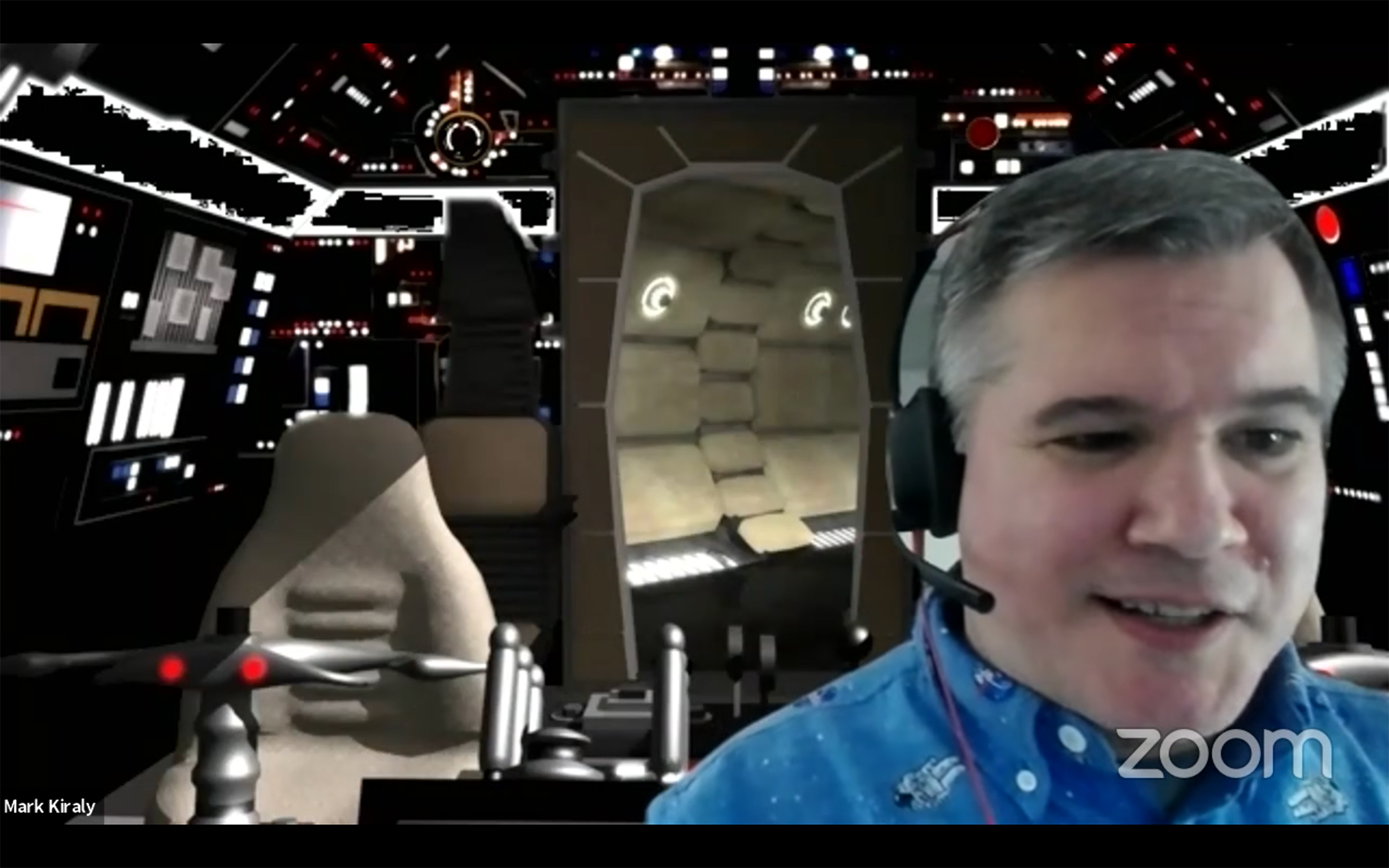 a screenshot from a virtual AP Calculus AB class showing teacher Mark Kiraly in front of a Millennium Falcon cockpit background