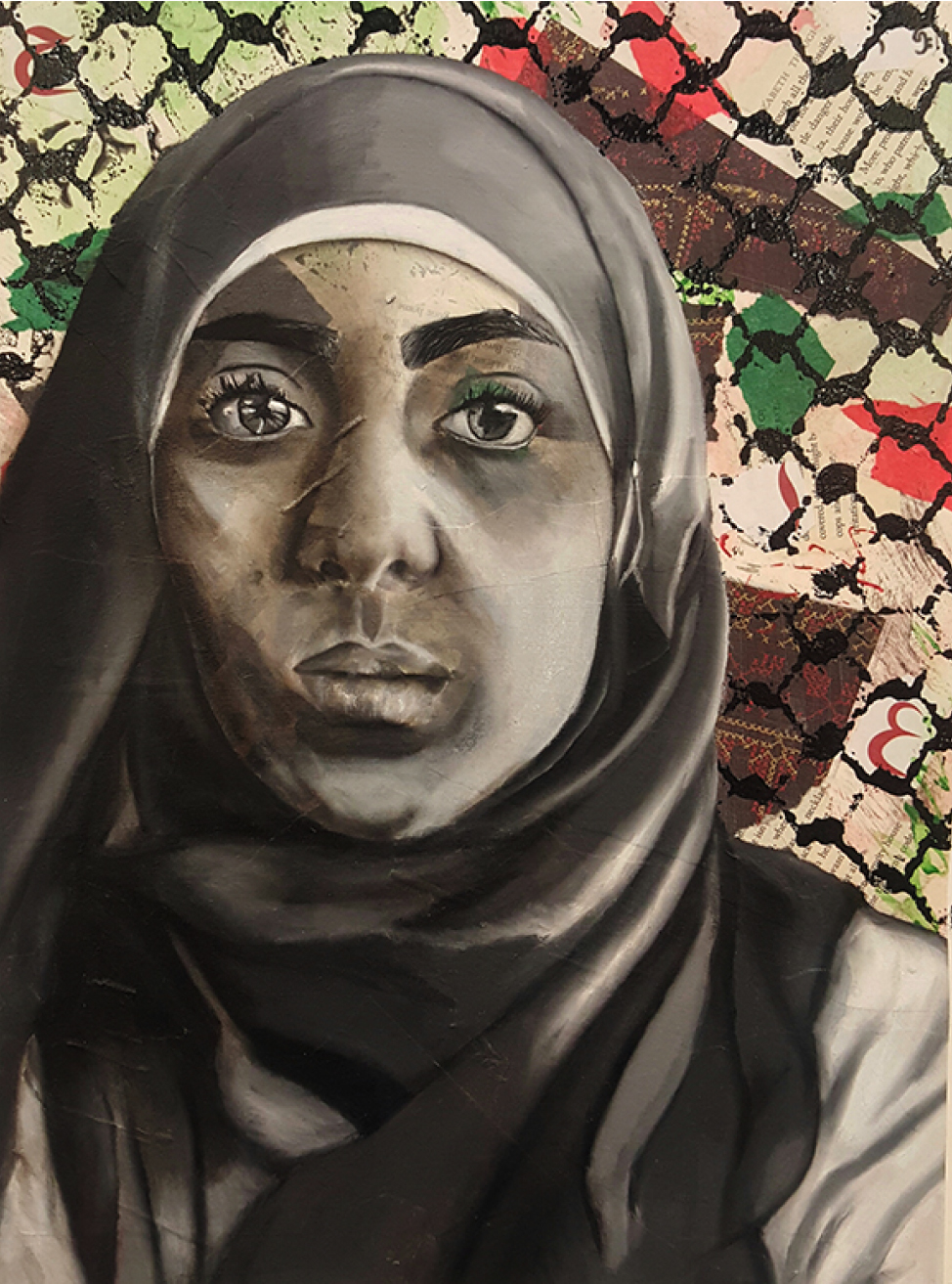 Black and white self portrait of a young woman in a head covering in front of a red, white, and green patterned background