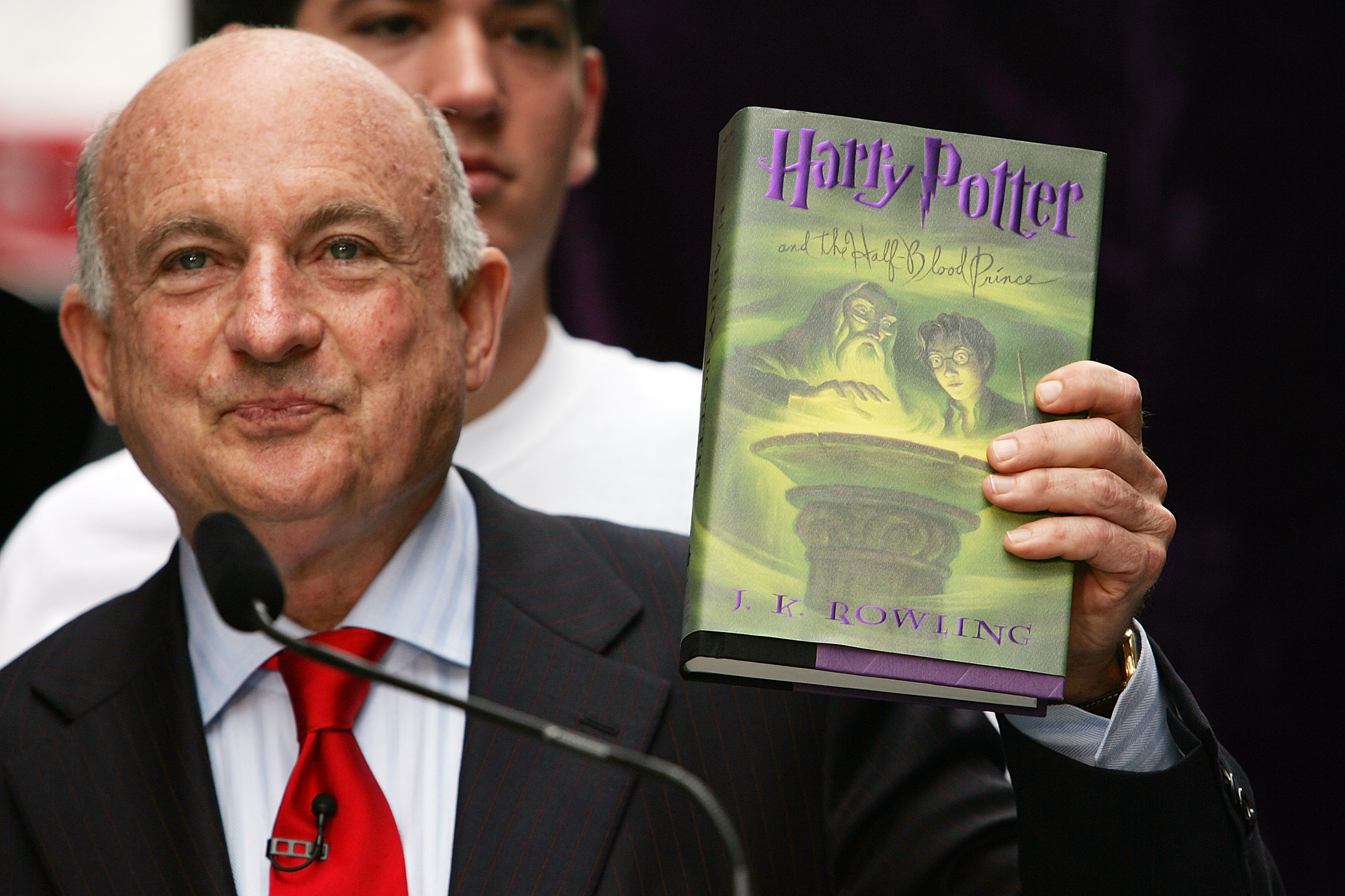 Scholastic CEO Dick Robinson holds the first author-signed American-edition of author J.K. Rowling's new book, 'Harry Potter and the Half-Blood Prince' July 15, 2005.