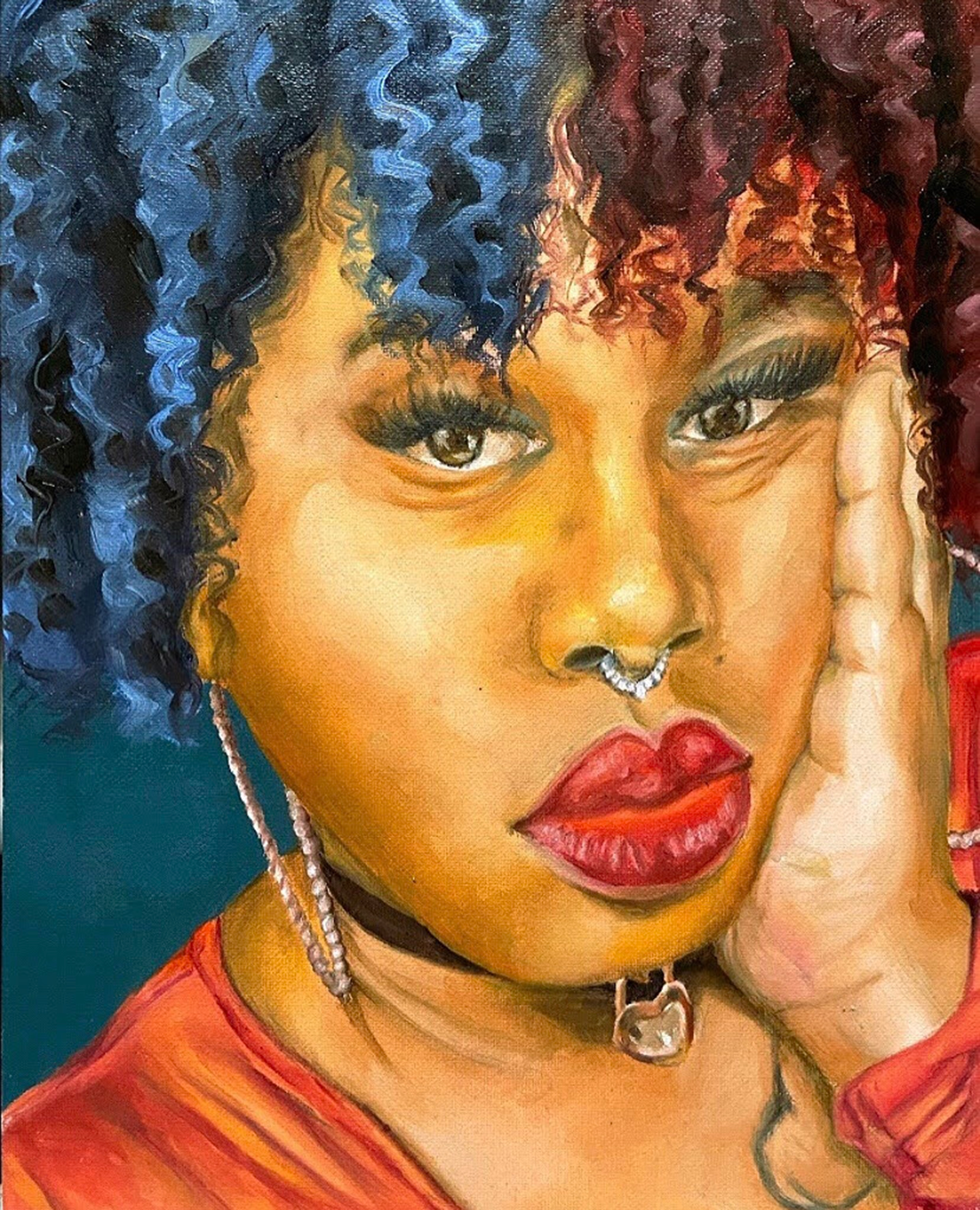 Portrait of a young black woman with blue and red hair, a nose ring, and a red shirt