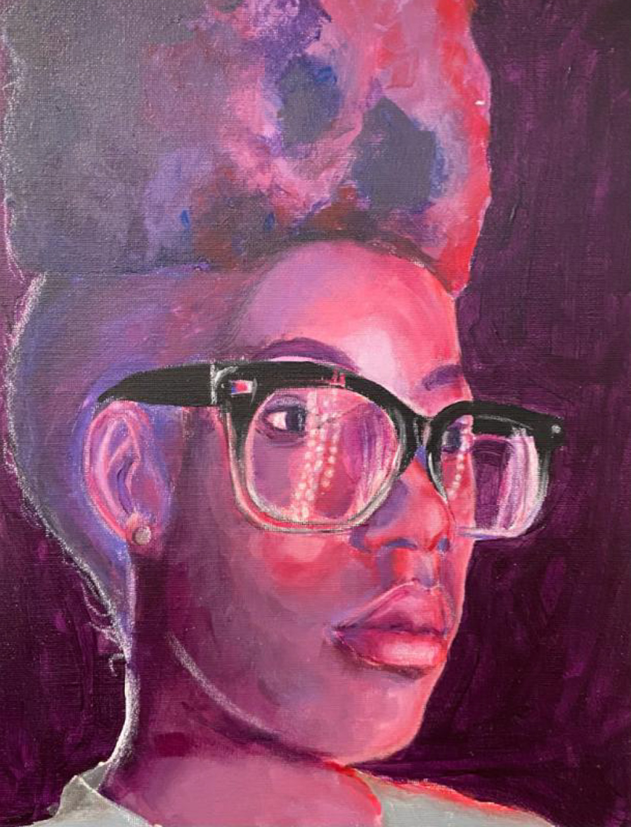 Portrait of a young black woman  in glasses in purple-red light