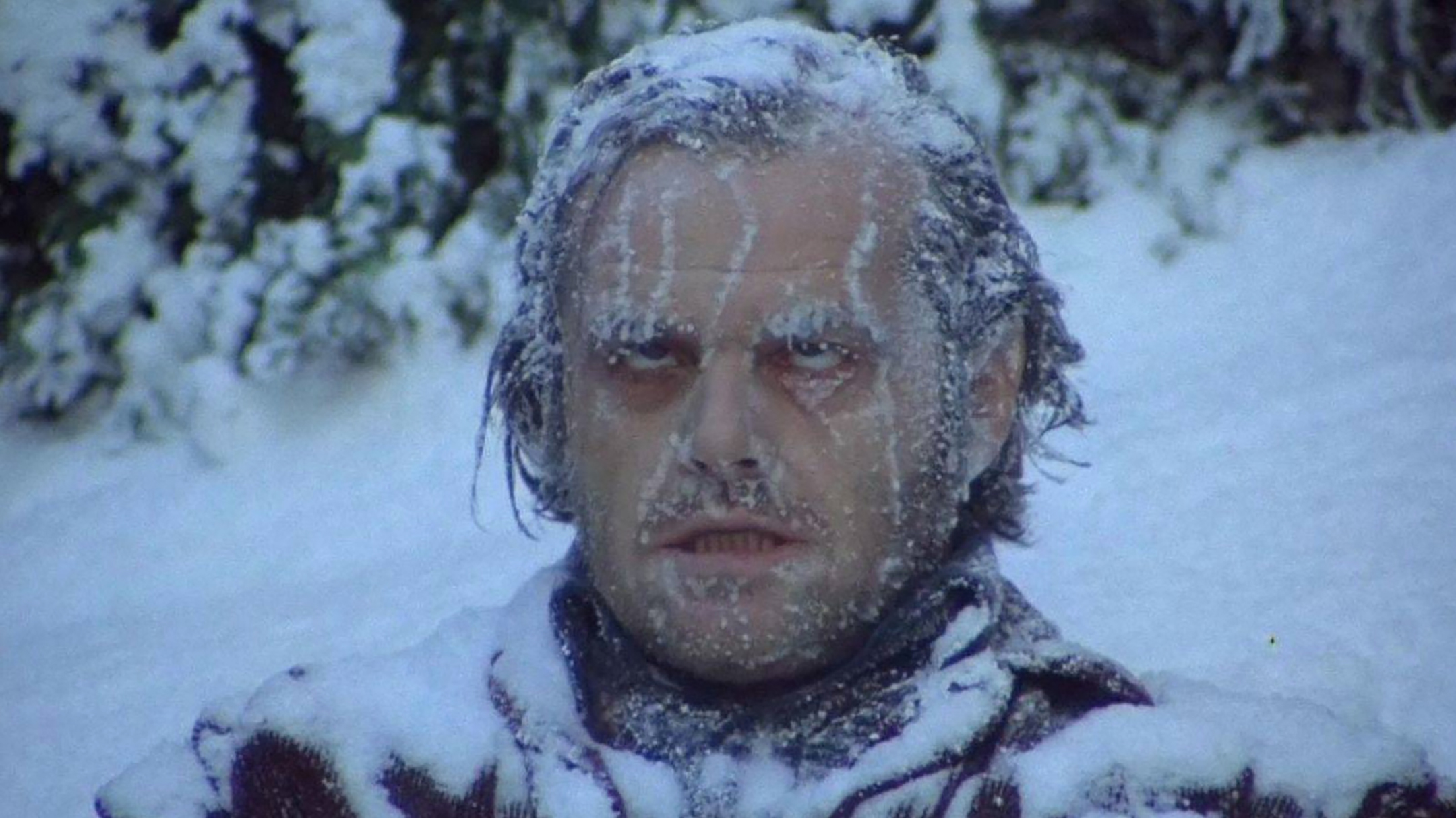 Still from the movie The Shining showing a frozen Jack Nicholson