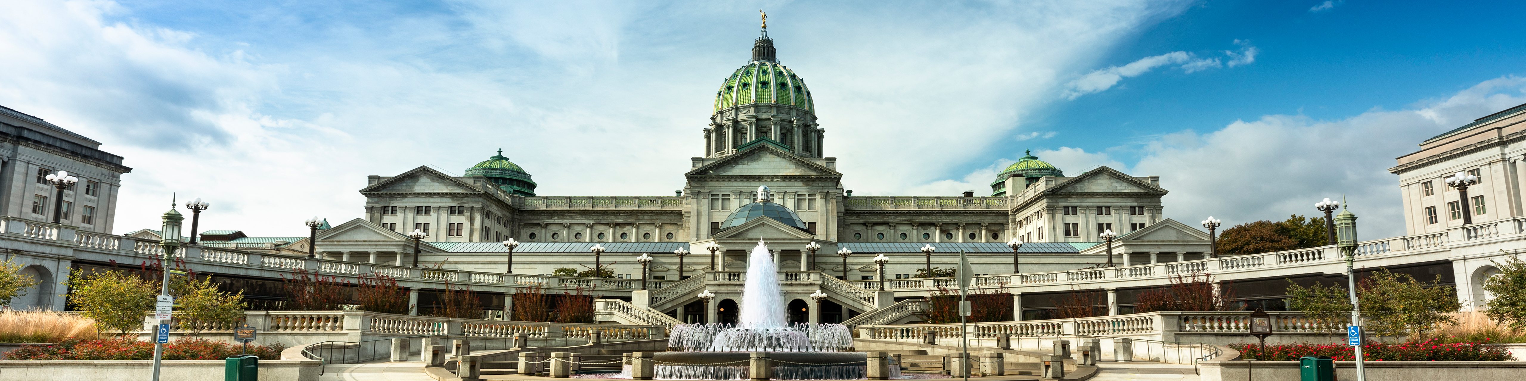 Building exterior and fountain of the Pennsylvania State Capitol building in downtown Harrisburg, PA