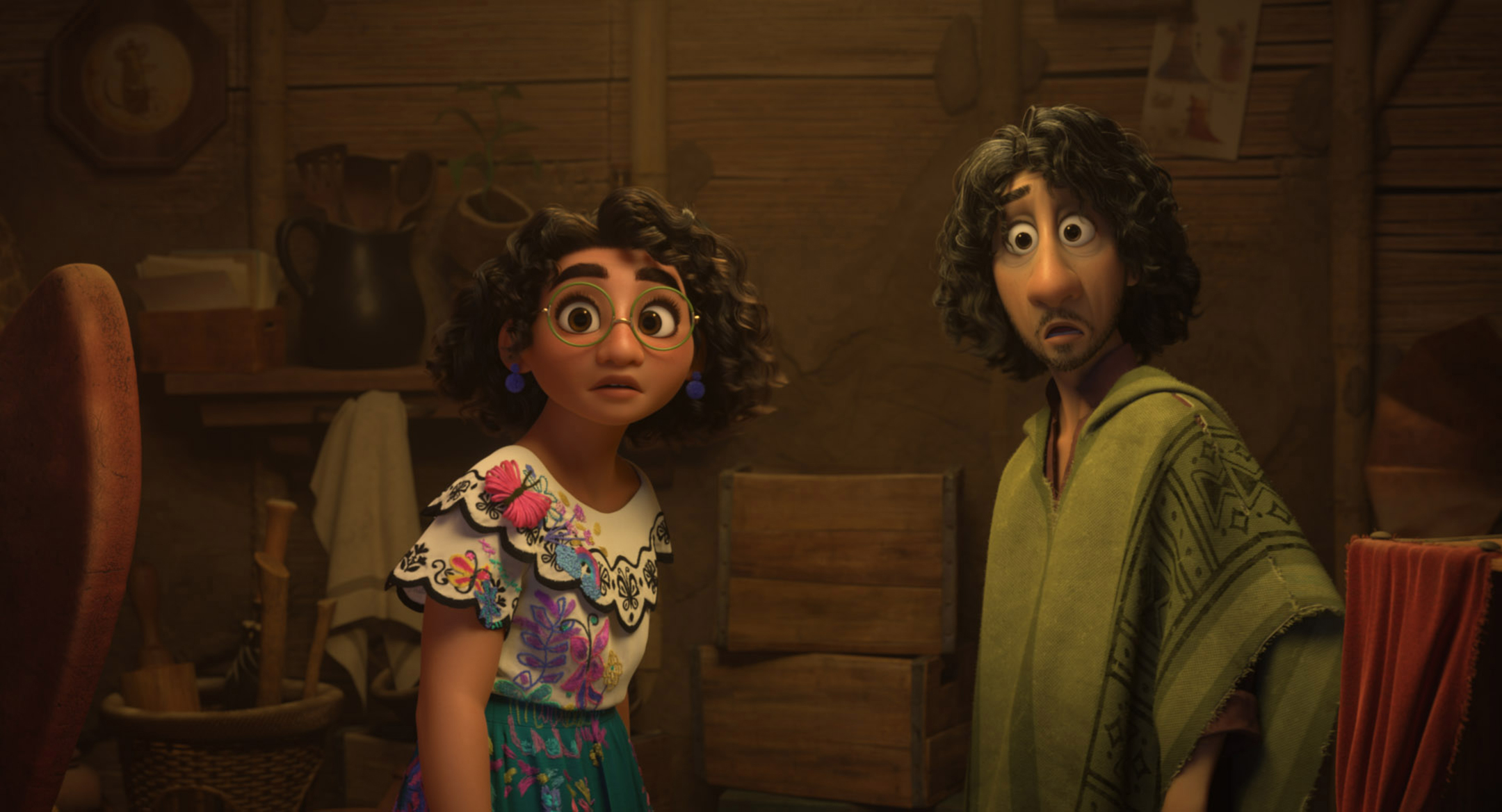 Scene from the animated movie Encanto with Mirabel on the left and Bruno on the right