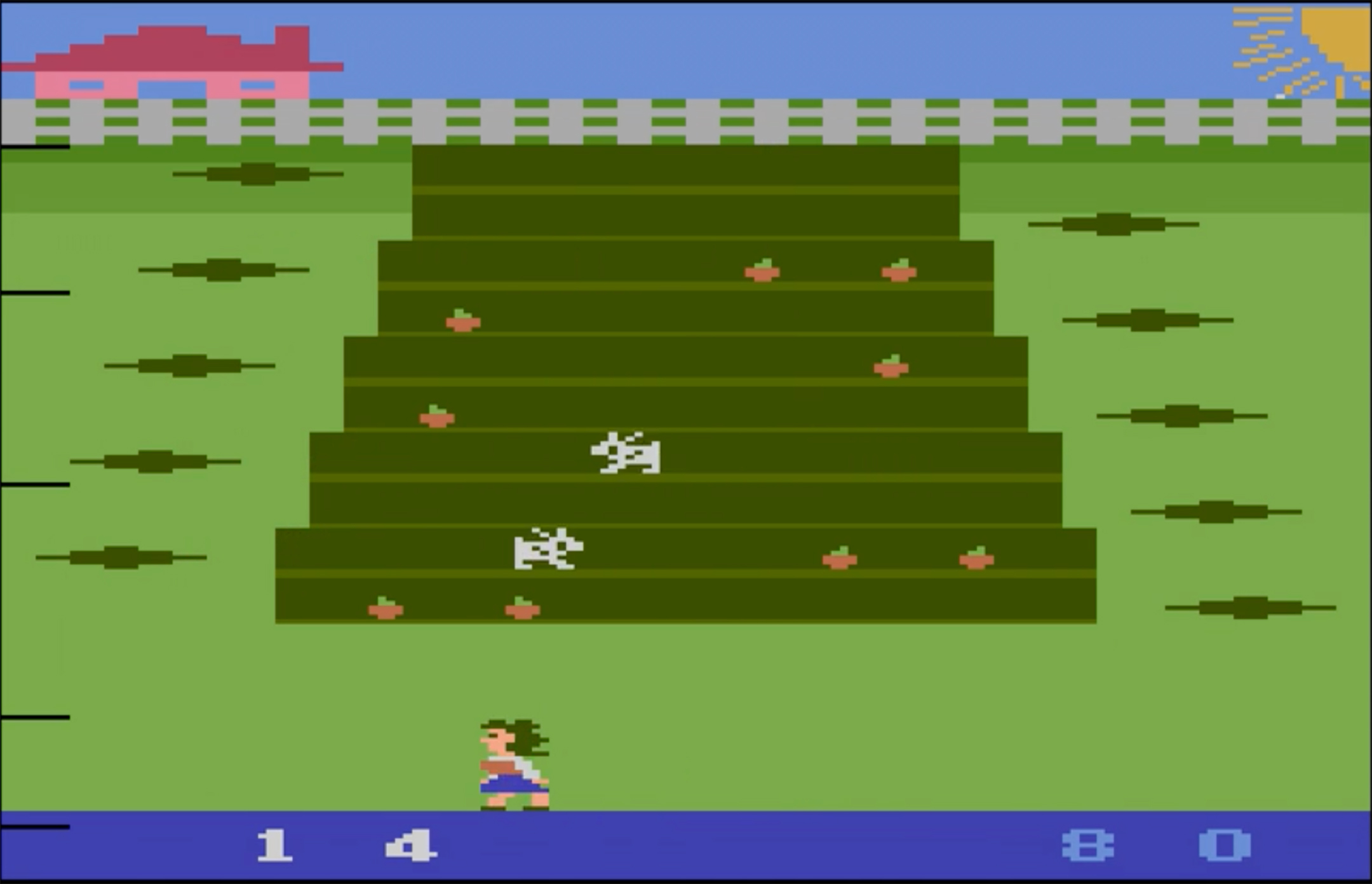 Screenshot from the game Wabbit, with a female character at the bottom of the screen, a garden filling the screen, and rabbits in the garden 