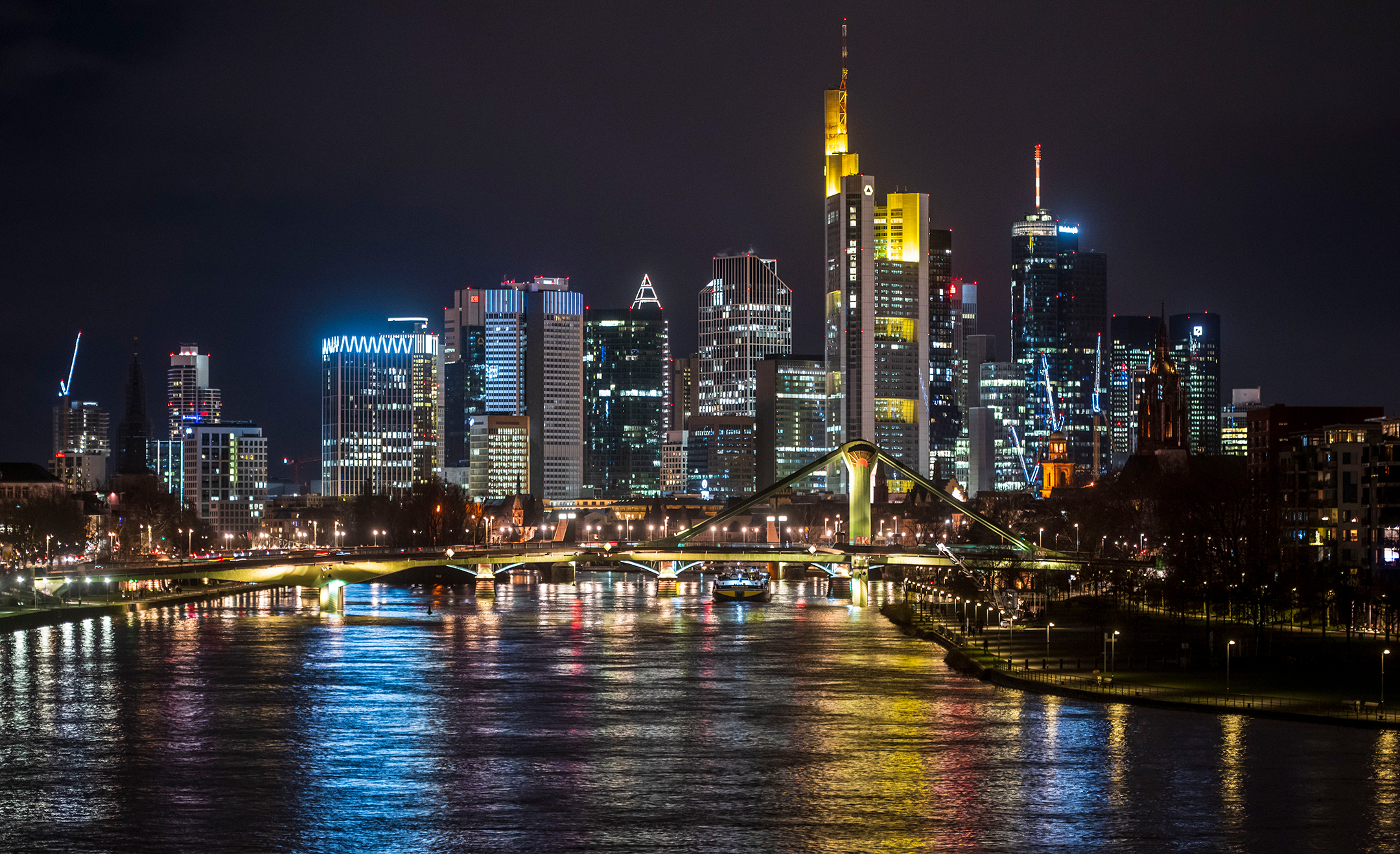 The skyline of Frankfurt's finance and banking district illuminated in the night