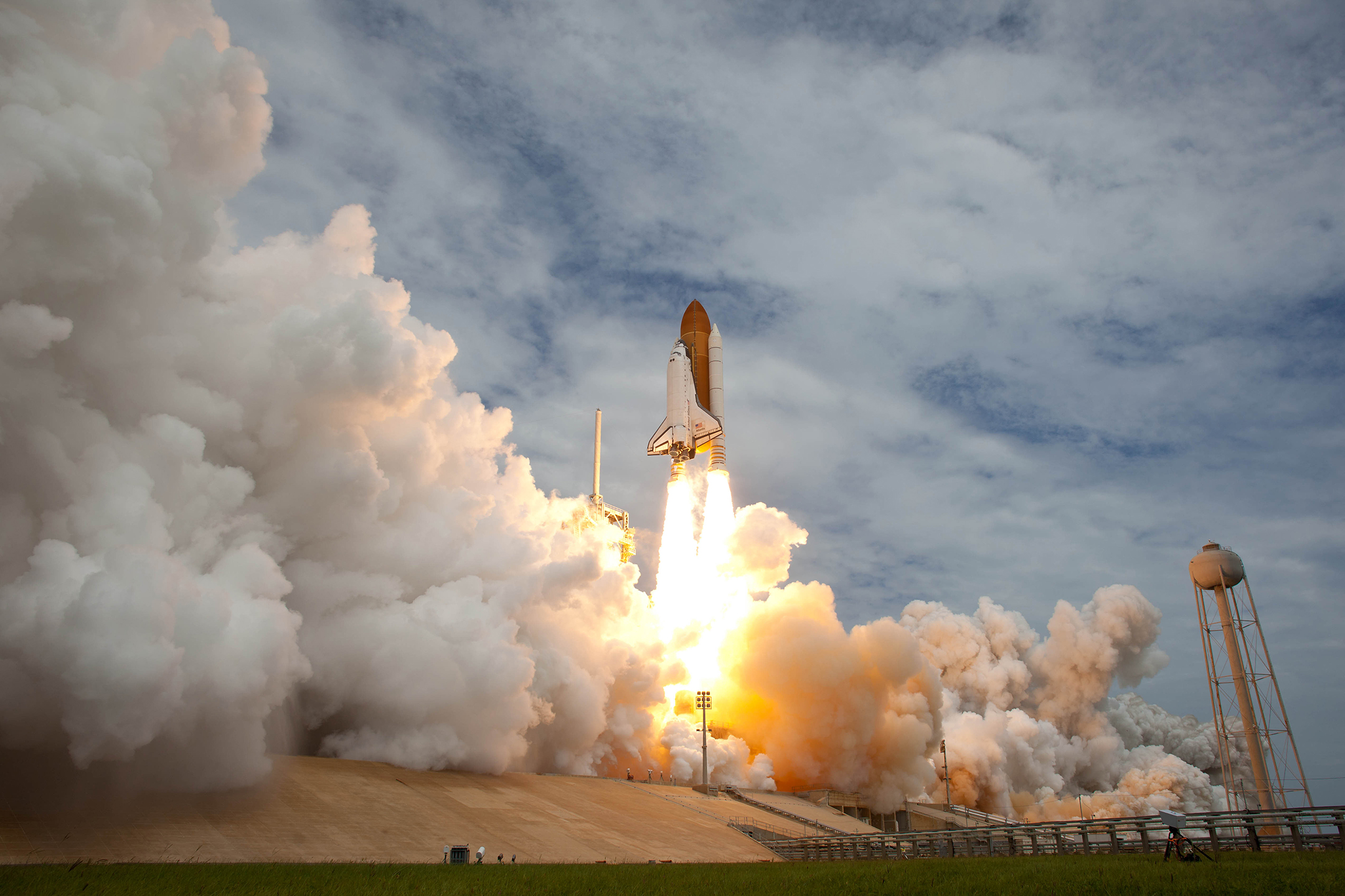 photo of space shuttle atlantis blasting off